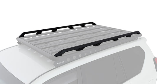 Roof rack with sleek black side rails for off-road vehicles.