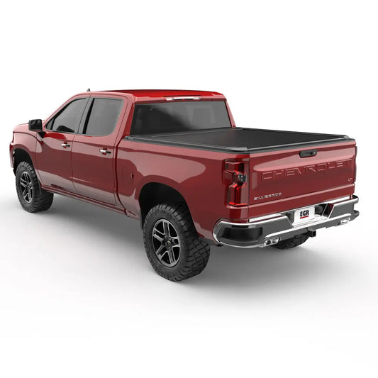 Red pickup truck with a sleek bed cover installed.