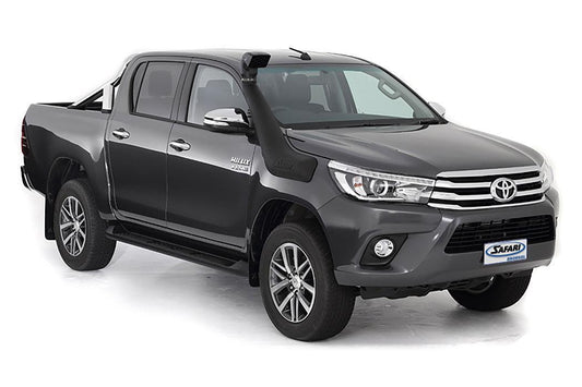 Gray Toyota Hilux pickup with double cab, parked on white background.