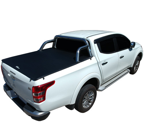 White pickup truck with a sleek, black roll cover and polished design.