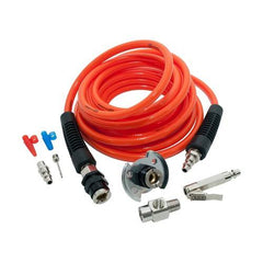 Coiled orange air hose with black ends, connectors, tools laid out on white.