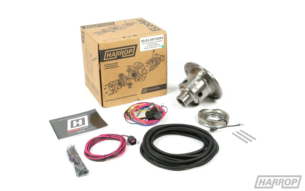 Harrop automotive kit with differential, wiring harnesses, manual, and box.