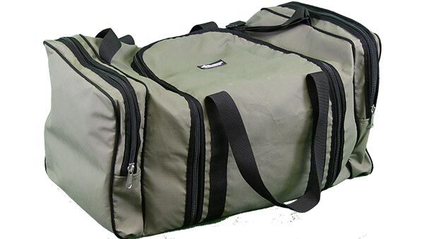 Large green duffel bag, black zippers and handles, multiple compartments.