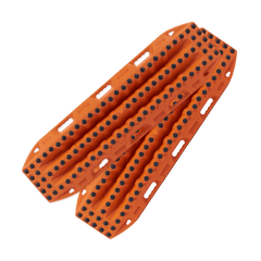 Pair of orange traction boards with blue studs for vehicle recovery.