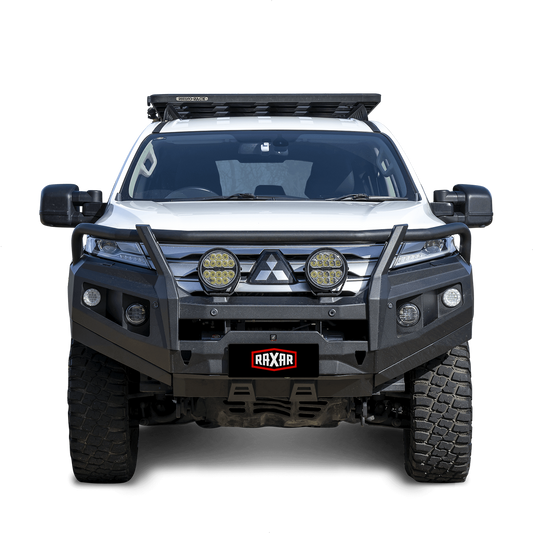 White off-road truck with a heavy-duty front bumper and LED lights