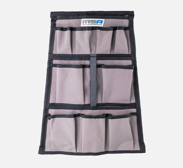 MSA Tool Organizer Grey fabric tool organizer with multiple storage pockets.