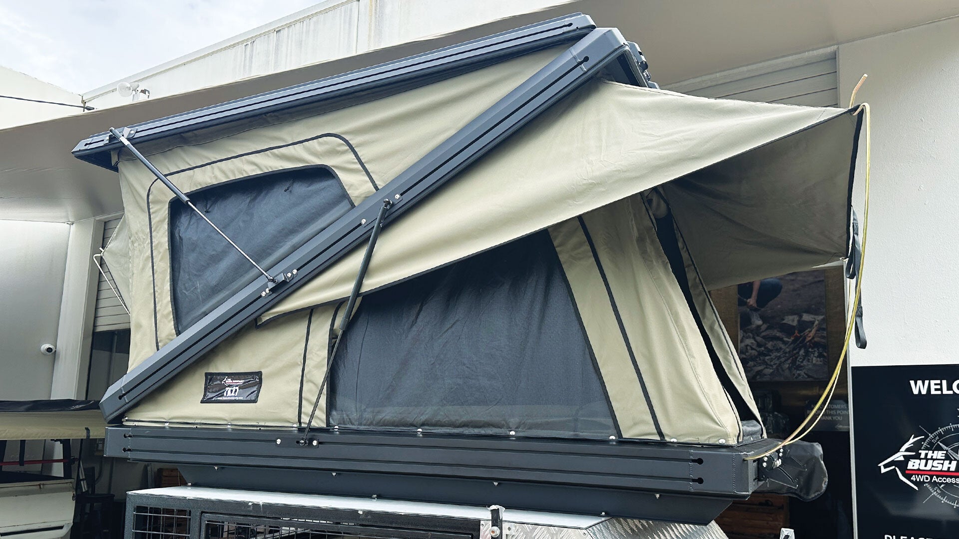 The Bush Company TX27 MAX Hardshell Rooftop Tent.