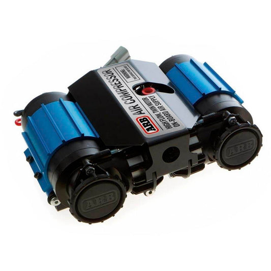 ARB dual air compressor, blue-black casing, multiple connection points. 1000