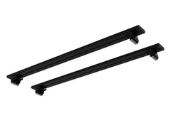 Two black aluminum crossbars for roof rack system on white background.