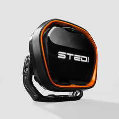 Black and orange LED light, STEDI brand on front.