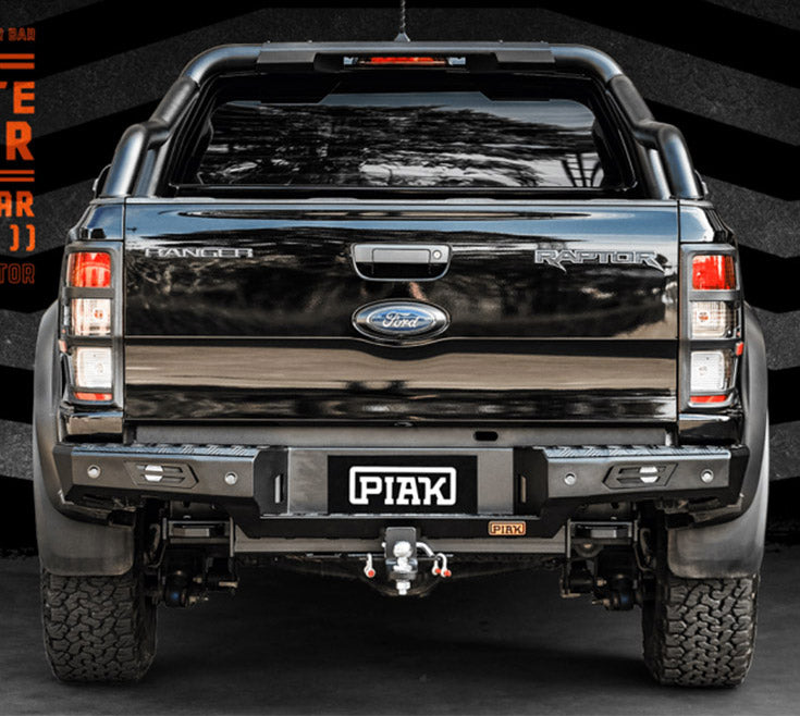 Rear view of Ford Ranger Raptor with PIAK bumper, rugged off-road accessories.